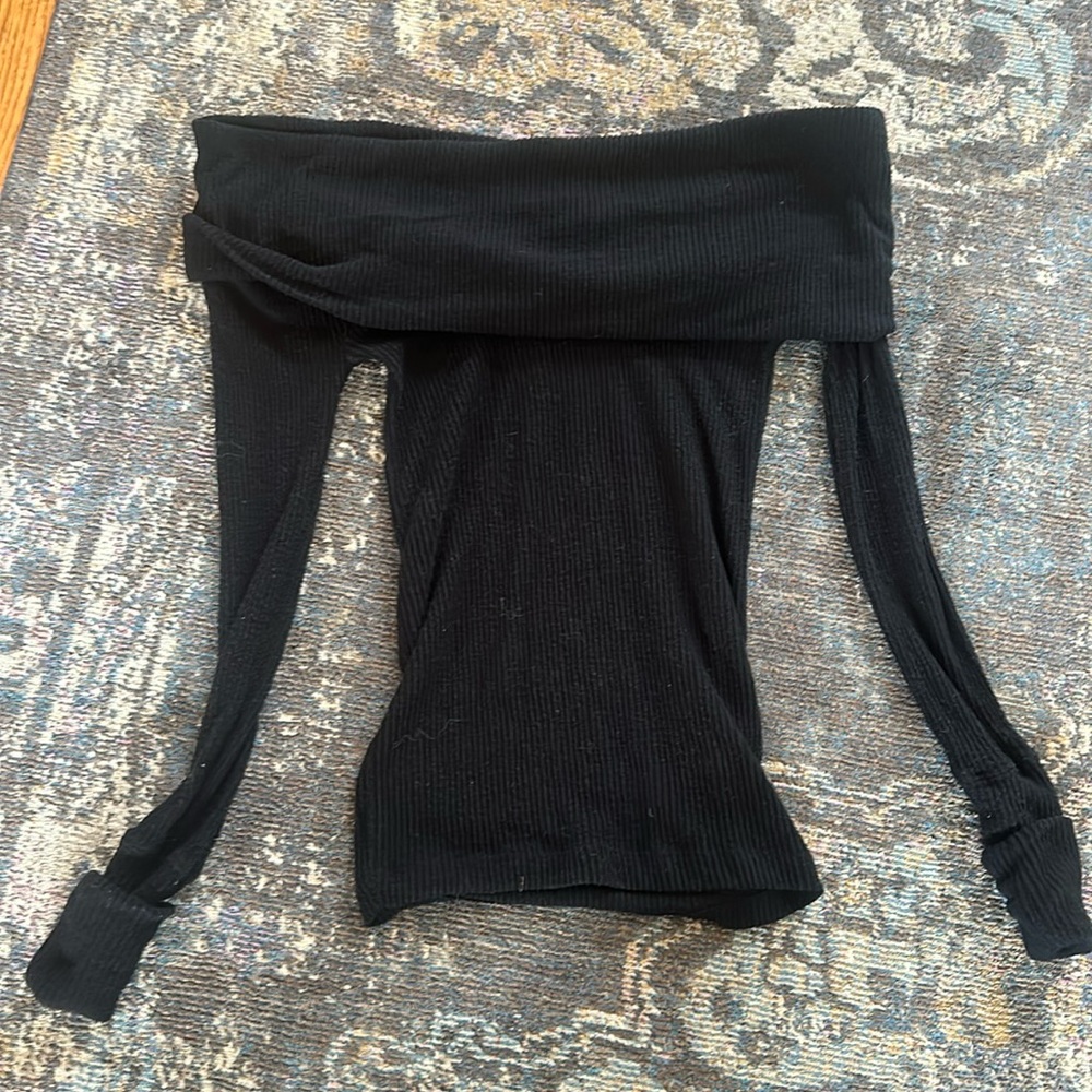 Off-the-shoulder black sweater